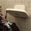 ADA_woman_changing_baby